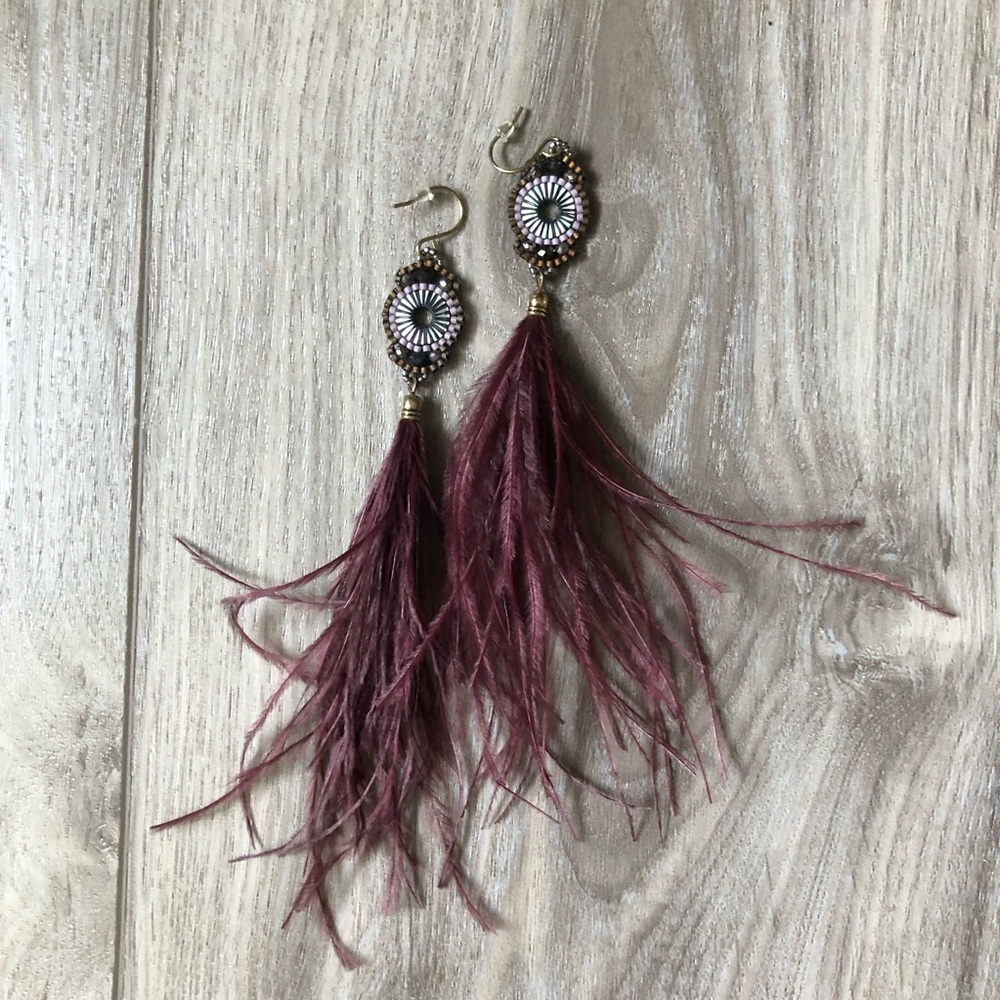 Purple beaded feather statement earrings